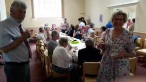 Celebration with coffee and cake after service.
